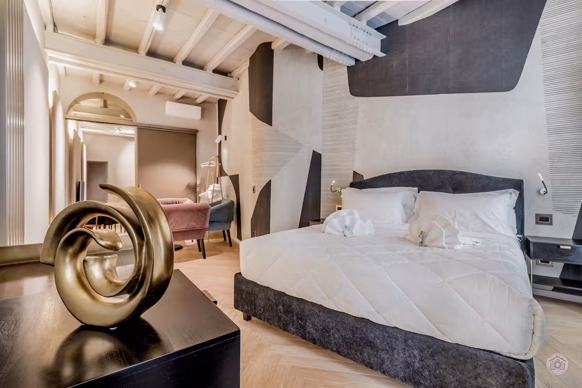 Bedroom with geometric mural in the Luxury Loft on Via del Babuino, Piazza di Spagna